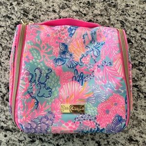 Lilly Pulitzer travel case with travel bottles